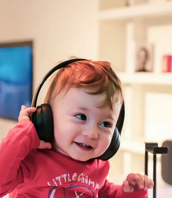 Listening child with earphones lg