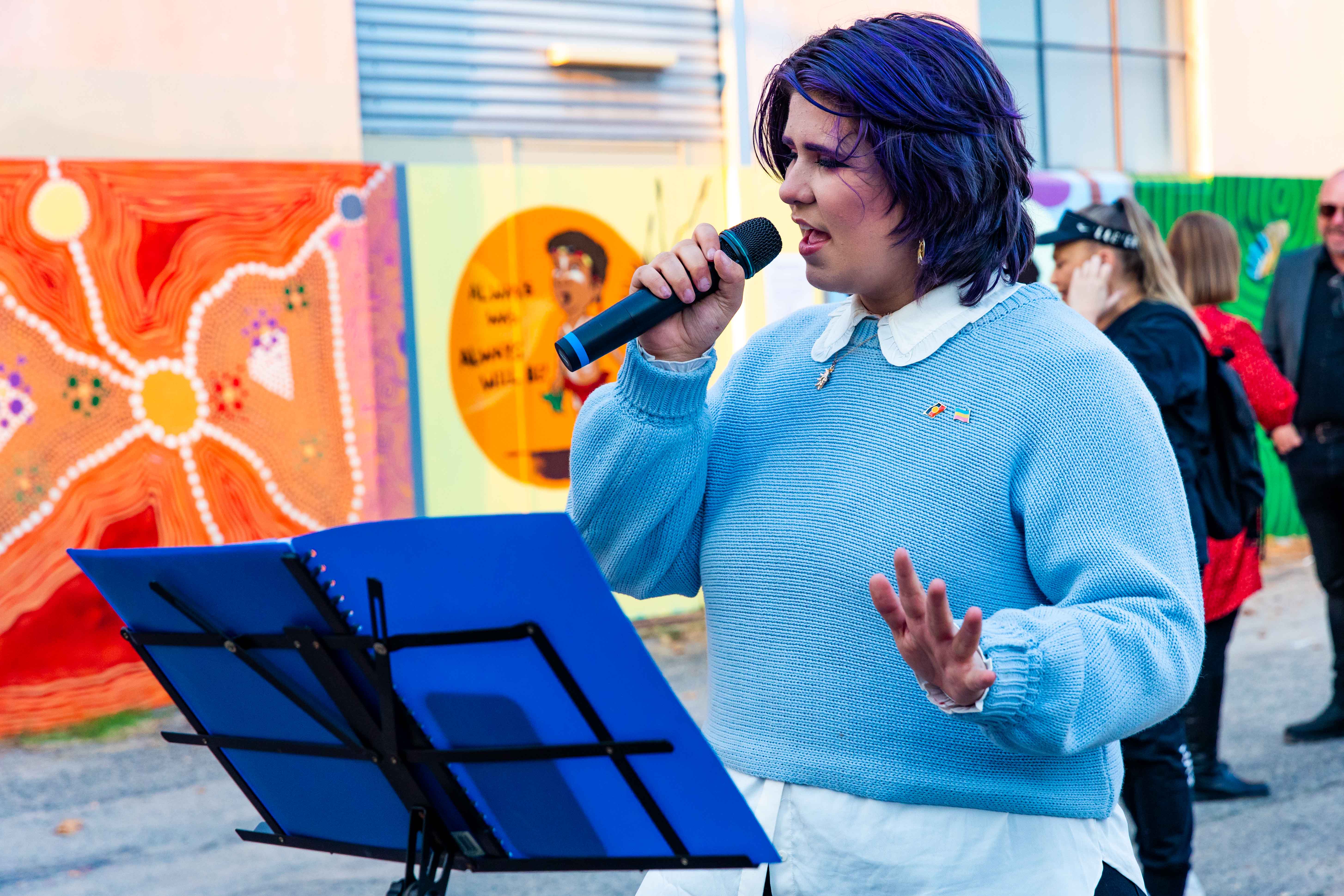 Indigo Ellis performing at the official opening of the Moorditj Mural Masters during the 2022 Youth Week WA KickstART Festival. Photo: Sophie Minissale.